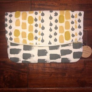 Fold over women’s clutch grey and mustard